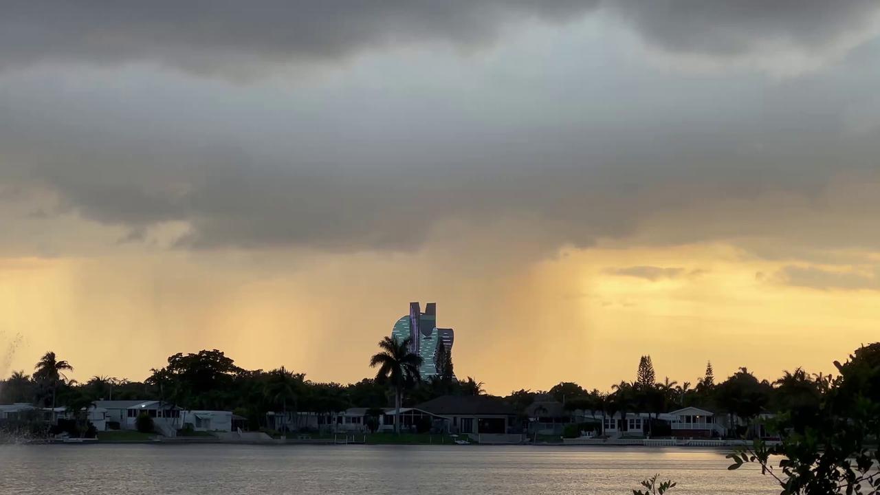 Video thumbnail for US: Heavy downpour during sunset time in Hollywood, FL.