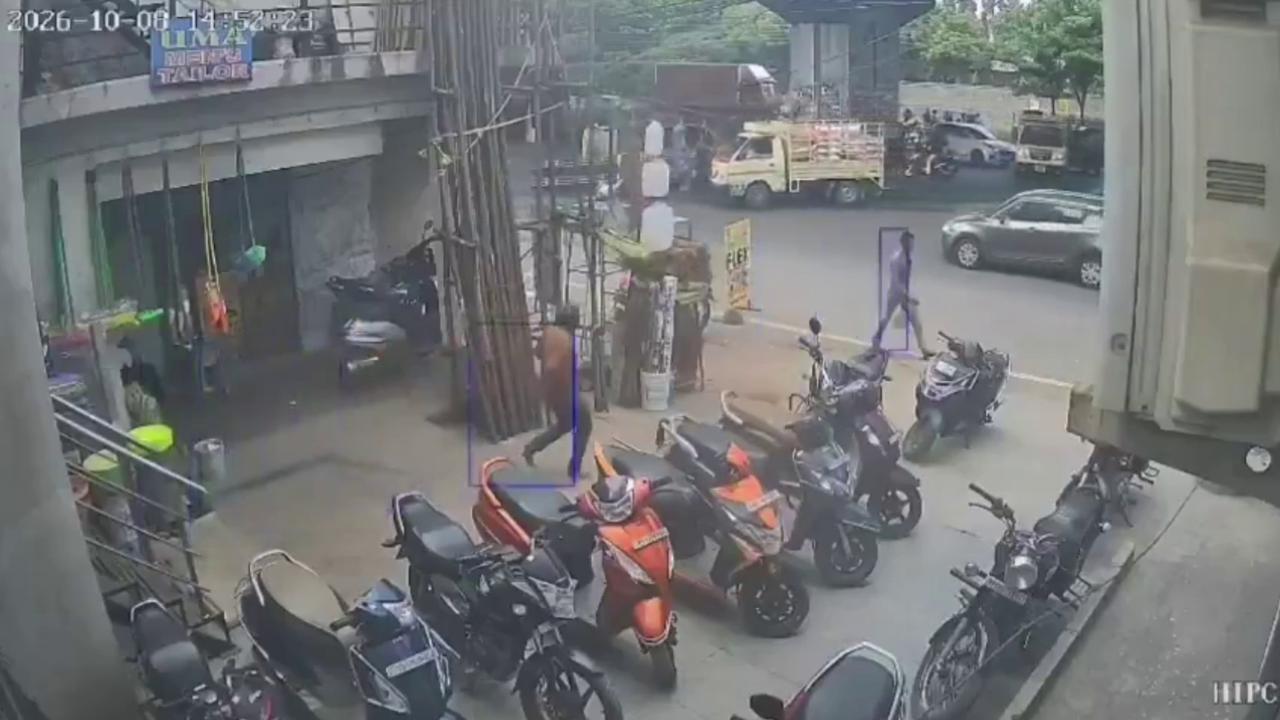 Video thumbnail for India: Iron pipes crash down from overturned auto-rickshaw as scooter rider loses life in Hyderabad.