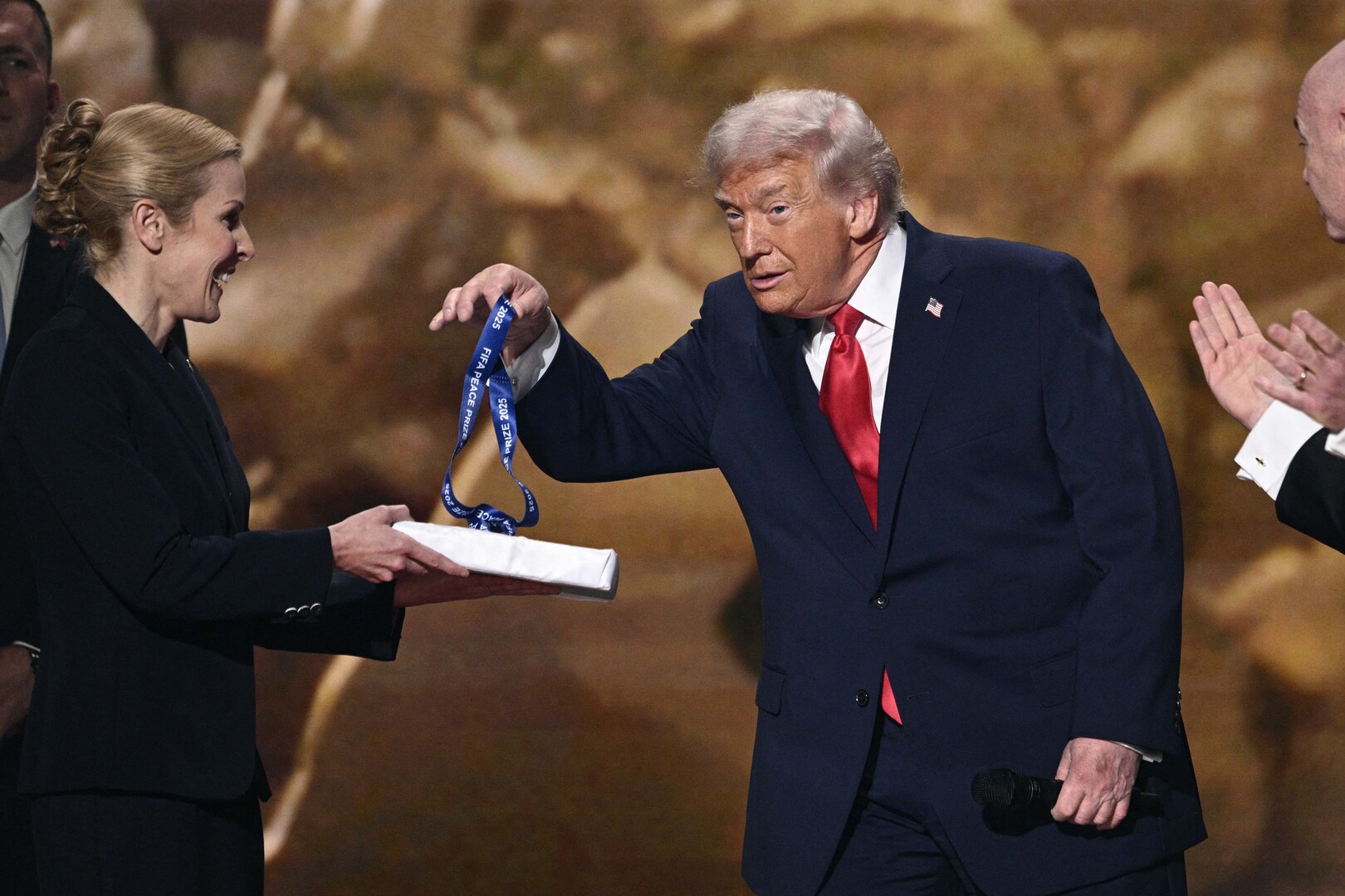 Video thumbnail for Trump takes the spotlight, Peace Prize at FIFA World Cup Draw