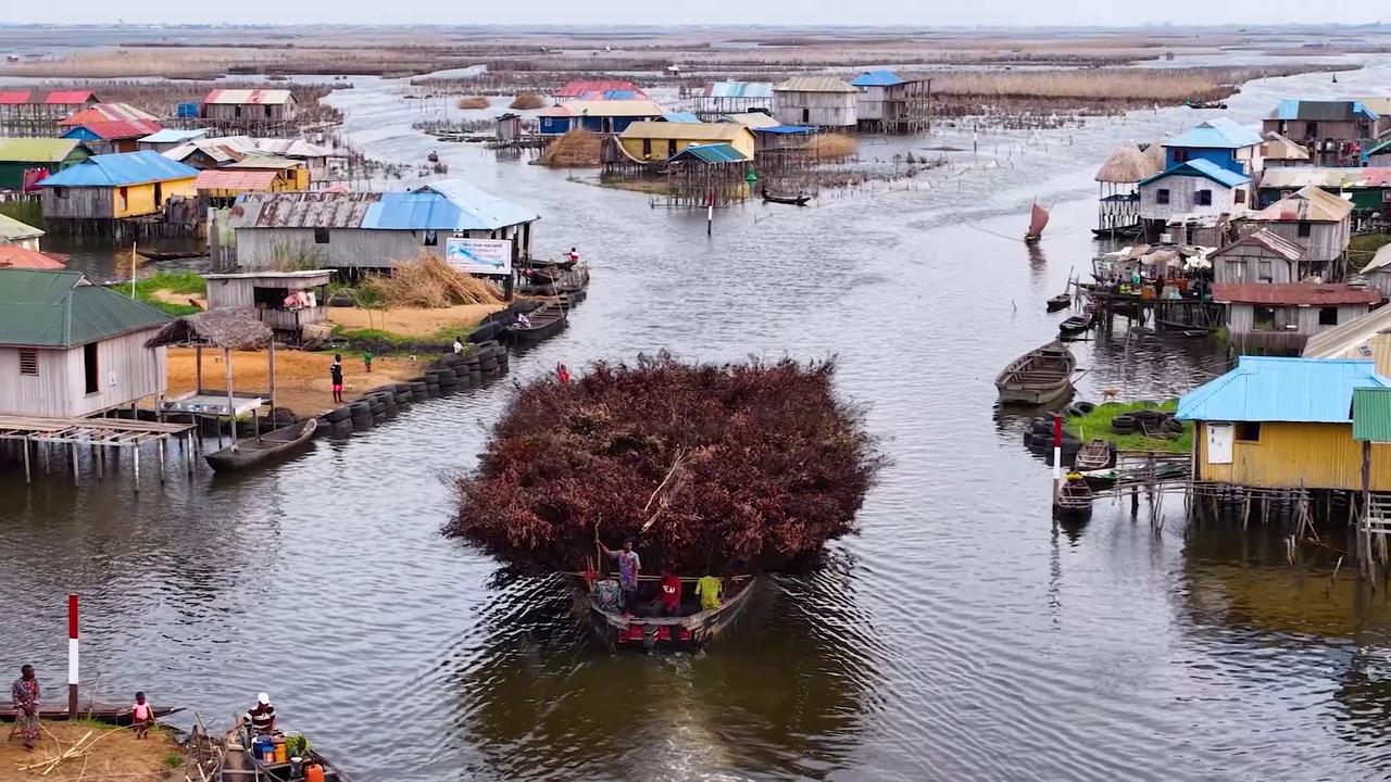 Video thumbnail for Benin: DRONE - Benin's floating village Ganvie: Venice of Africa.