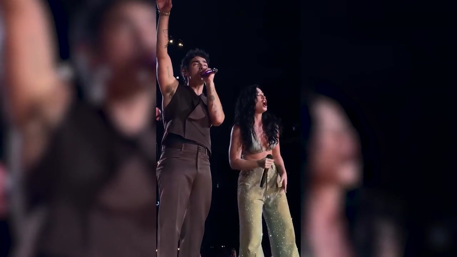 'Video thumbnail for Exes Joe Jonas and Demi Lovato reunite for 'Camp Rock' performance'
