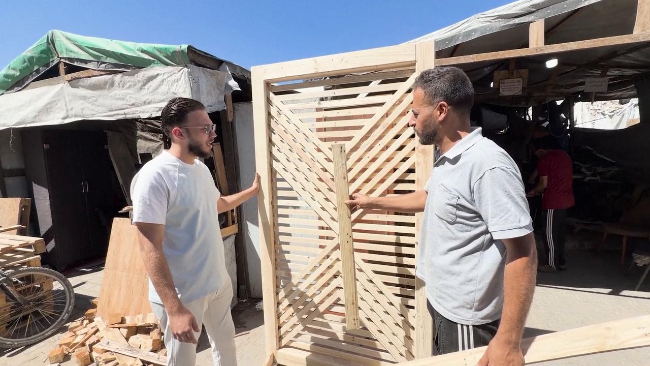Video thumbnail for Gazans turn aid pallets into furniture, classrooms as wood shortages bite.