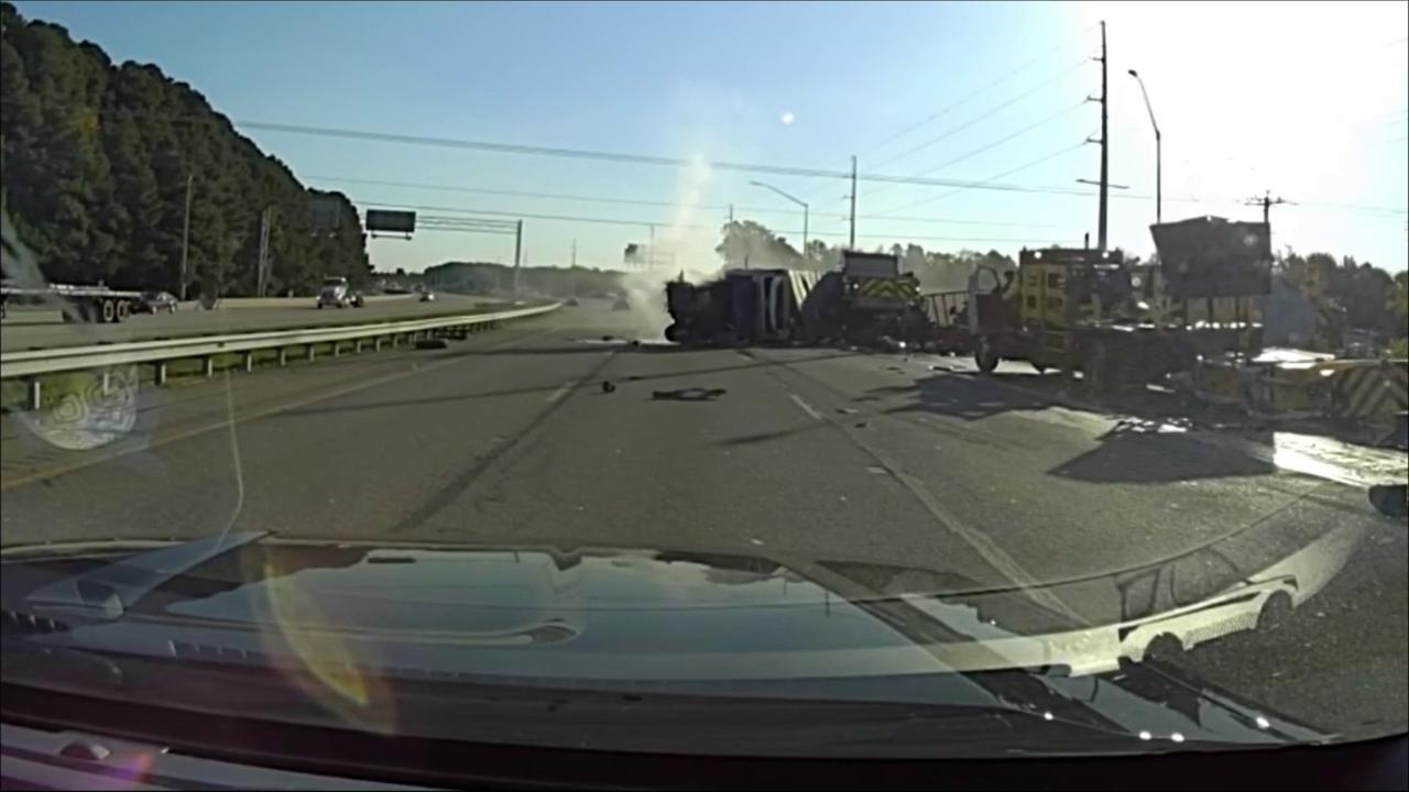 Video thumbnail for US: Truck Plows Into Two Highway Work Vehicles In Maryland Crash Caught On Police Dashcam.