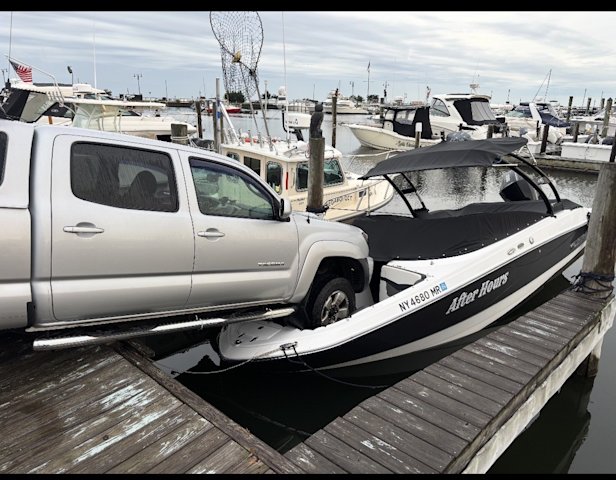 Video thumbnail for Truck drives onto boat at Bay Shore marina