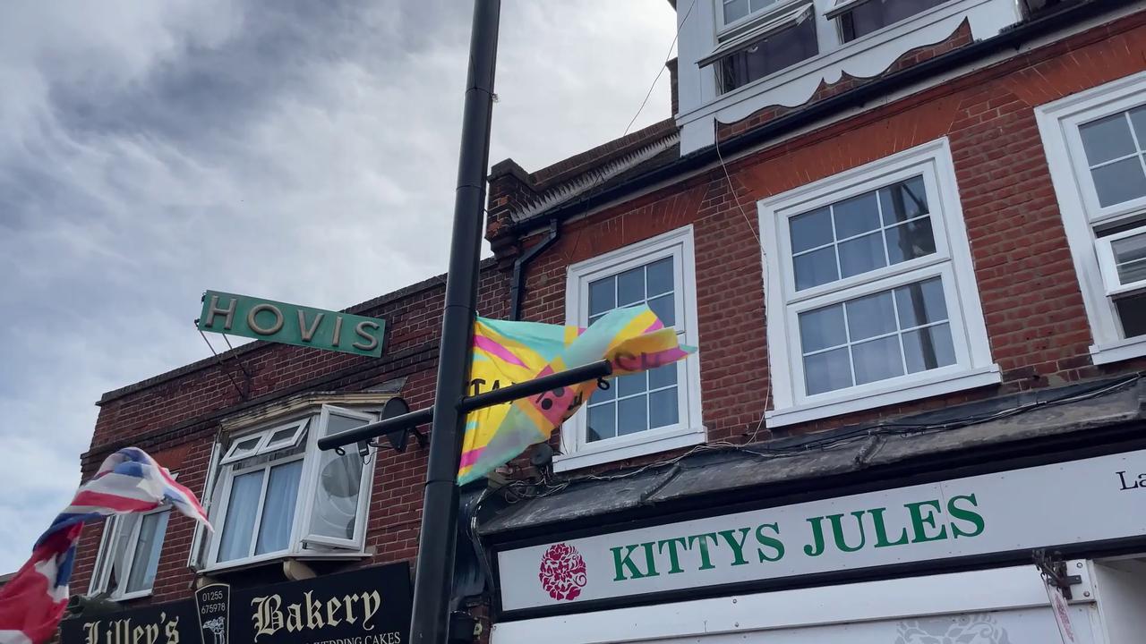 Video thumbnail for UK: Protesters Replace British Flags With "Tax The Rich" Banners In Clacton.