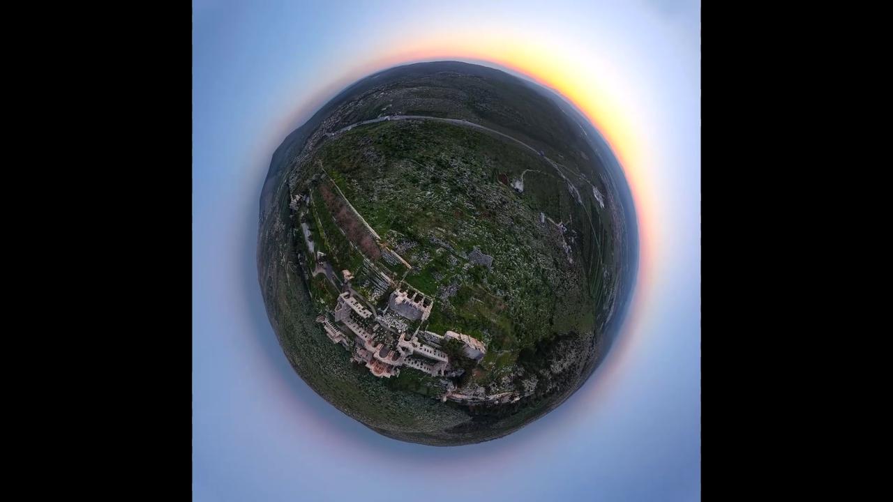 Video thumbnail for Syria: 360 degree tiny planet aerial view of a Syrian city.