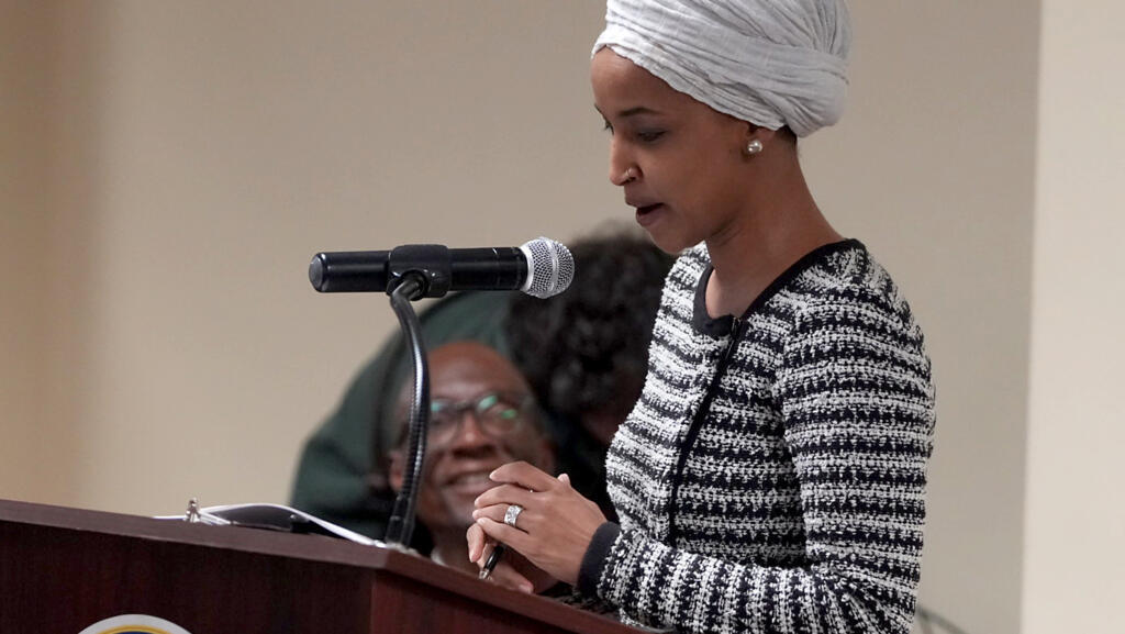 Video thumbnail for Democrat Ilhan Omar sprayed by unknown substance during speech in Minneapolis