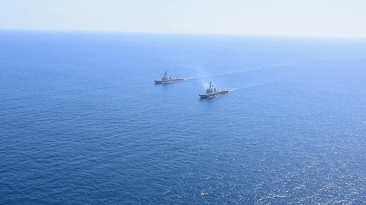 Video thumbnail for US: Newest U.S. Navy Destroyer Sails Alongside USS Daniel Inouye Off San Diego.