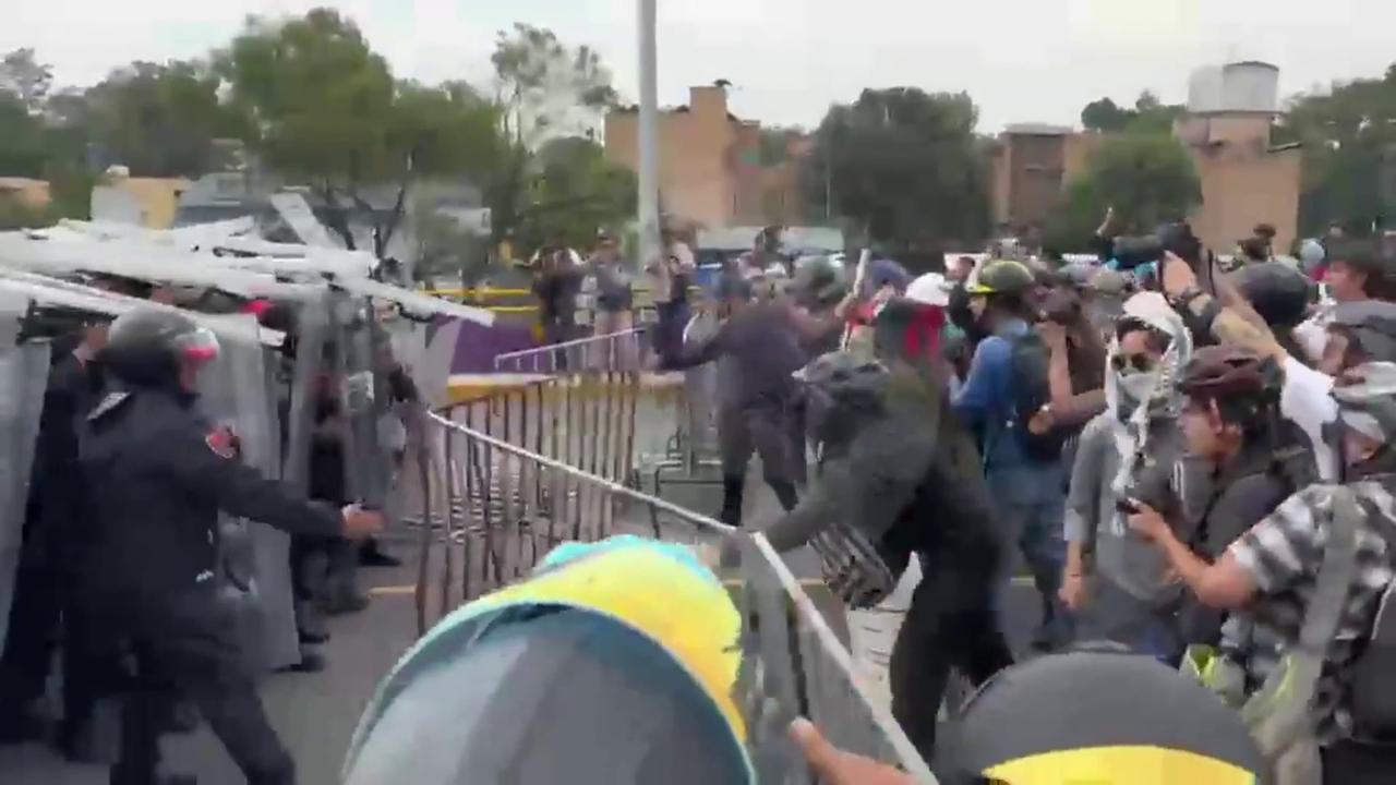 Video thumbnail for Mexico: Mexico City Protesters Clash With Riot Police As World Cup Spotlight Draws Attention To Social Demands.