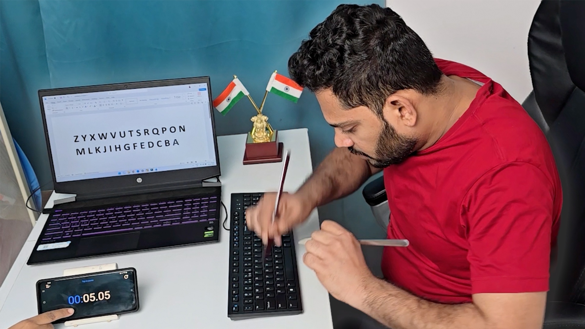 Video thumbnail for Fastest time to type the alphabet backwards using cutlery (both hands) - 5.41 second by Elavarasan S