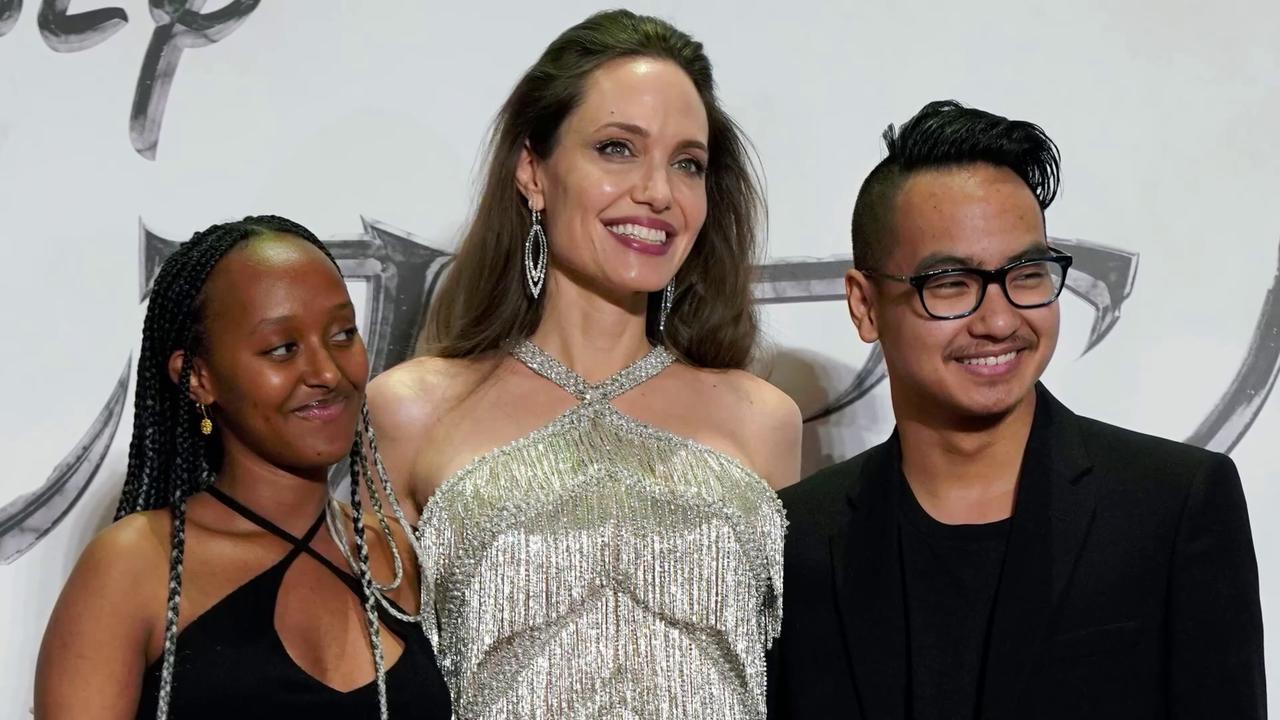 Video thumbnail for UNCAPTIONED: Angelina Jolie and Brad Pitt's daughter Zahara legally drops father's last name.