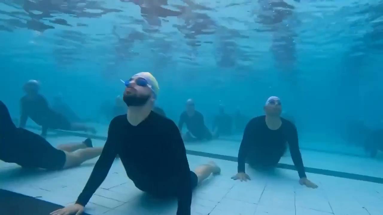 Video thumbnail for India: Indian Navy conducts underwater yoga session marking International Yoga Day.