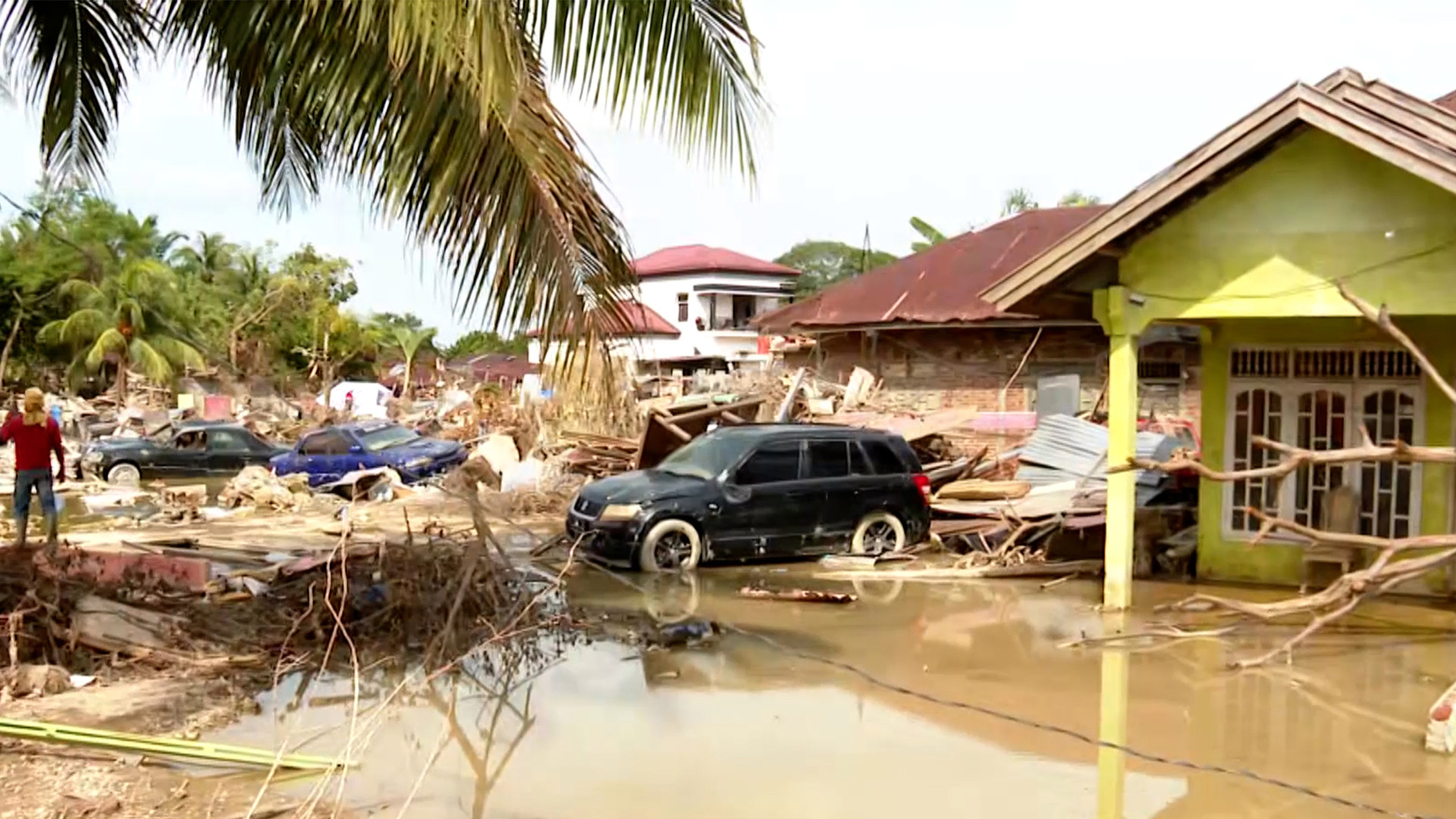 Video thumbnail for Families shelter in makeshift tents after floods ravage Indonesia’s Sumatra