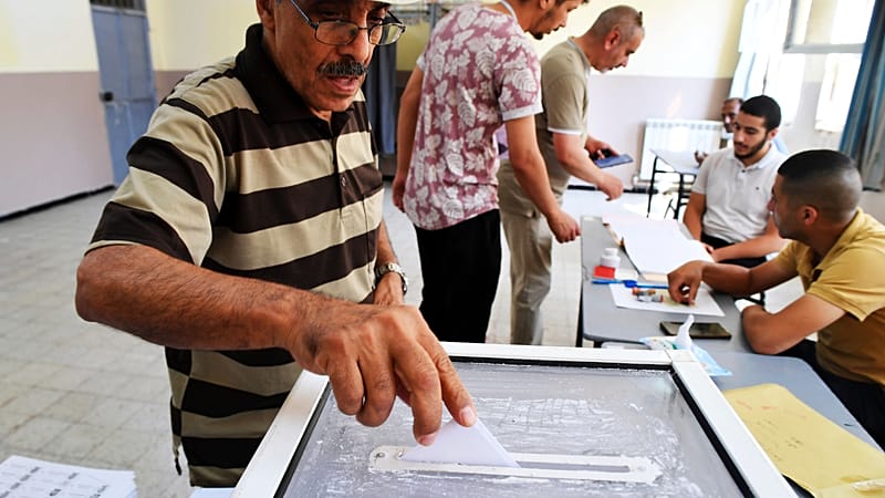 Video thumbnail for Algerians vote for new parliament with turnout in focus