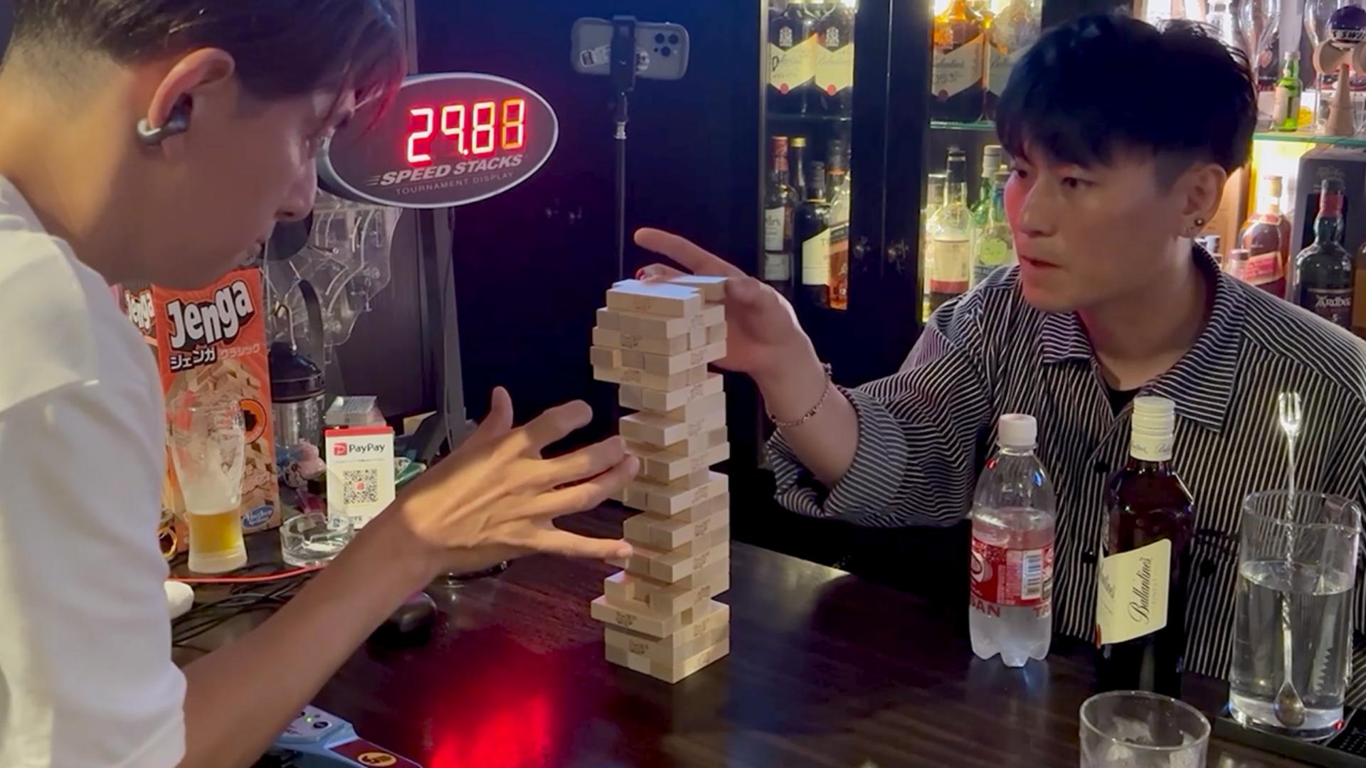 Video thumbnail for Most Jenga blocks removed in one minute (team of two) - 23 by NAOKI and Momocchi