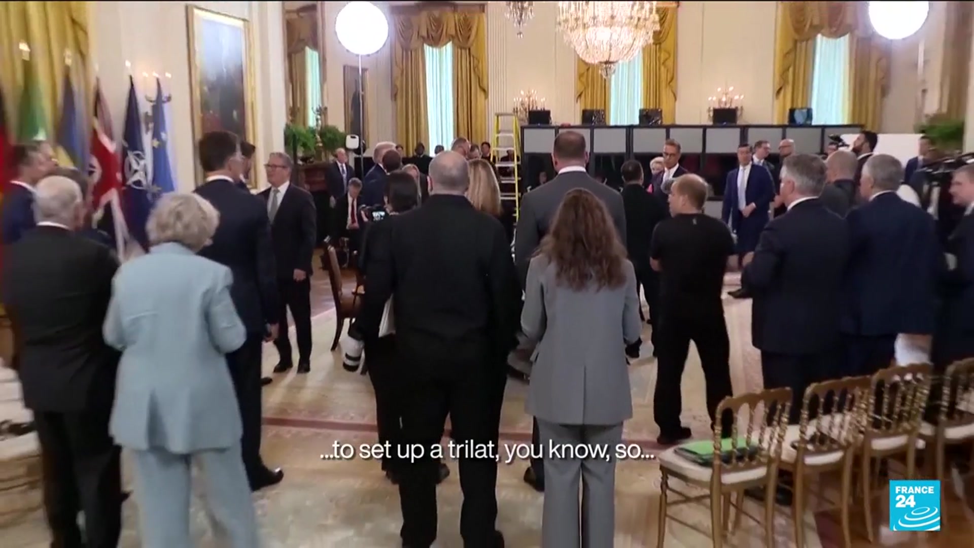 'Video thumbnail for Trump plans Putin-Zelensky meeting while affirming security guarantees'