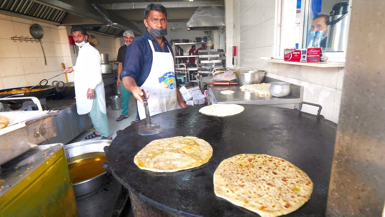 Video thumbnail for 7 a.m. PAKISTANI BREAKFAST in Muscat, Oman!! Halwa Puri, Chana Dal & Shami Kebab