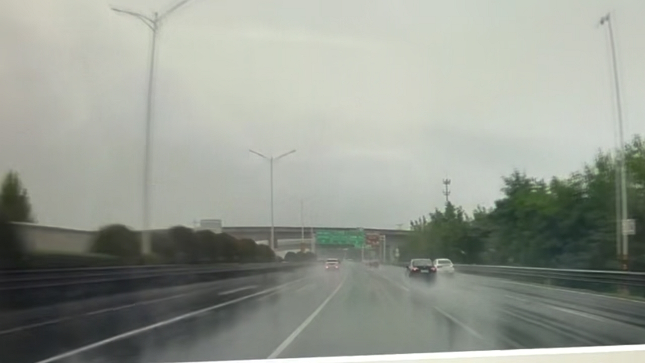 Video thumbnail for Black Car Skids and Hits Barrier on Wet Jiangsu Highway
