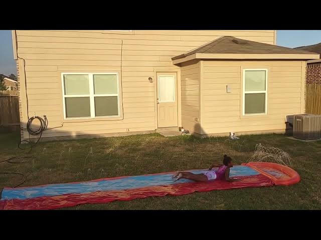 Video thumbnail for Rontryelle first slip and slide.