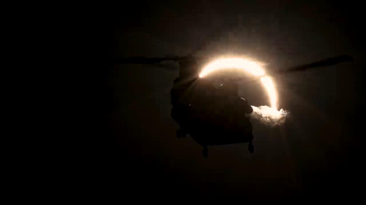 Video thumbnail for UK: Solar Eclipse Turns UK Sky Dark As Military Helicopter Takes Flight.