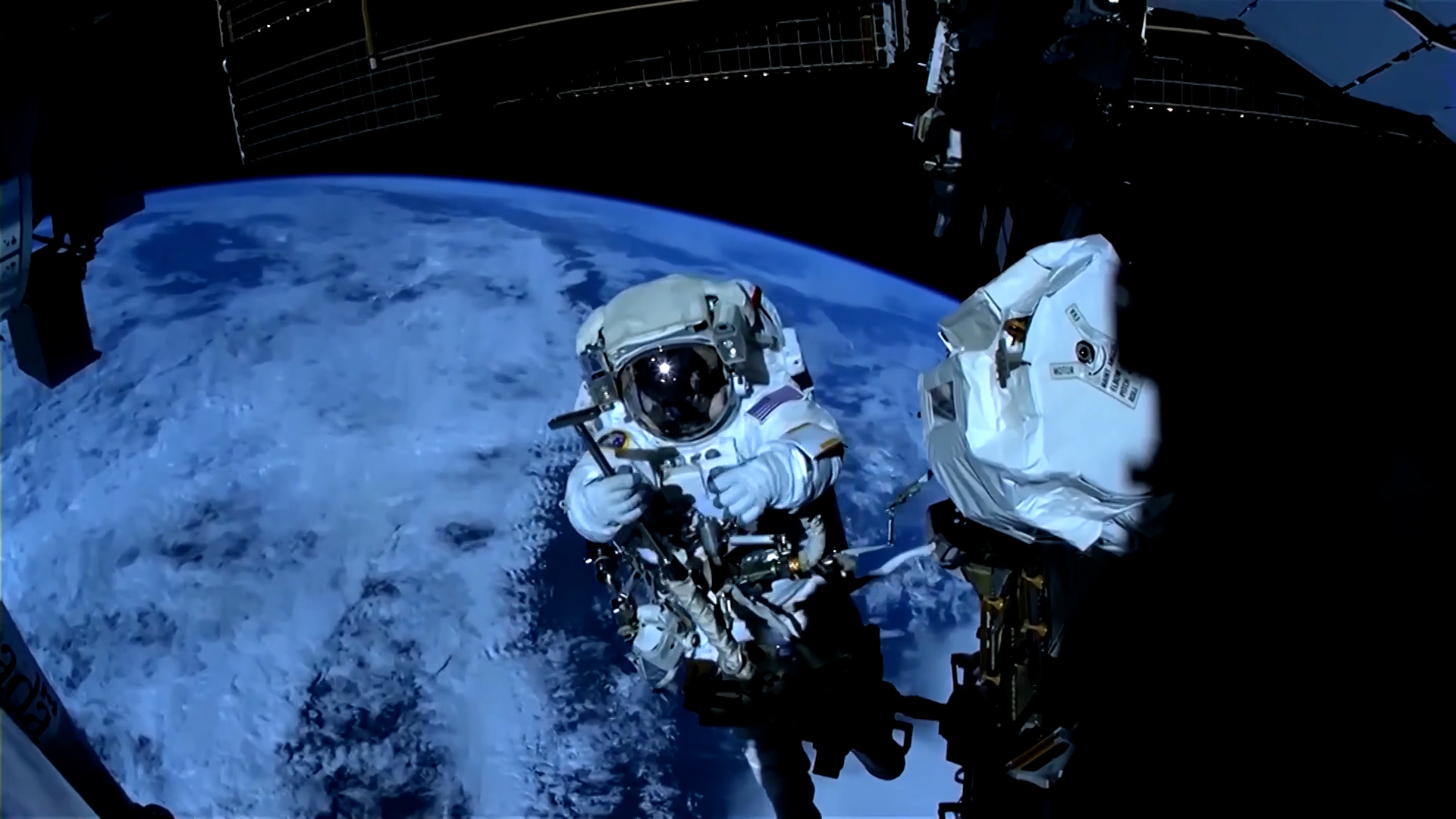 Video thumbnail for NASA astronauts spacewalk to fix robotic arm