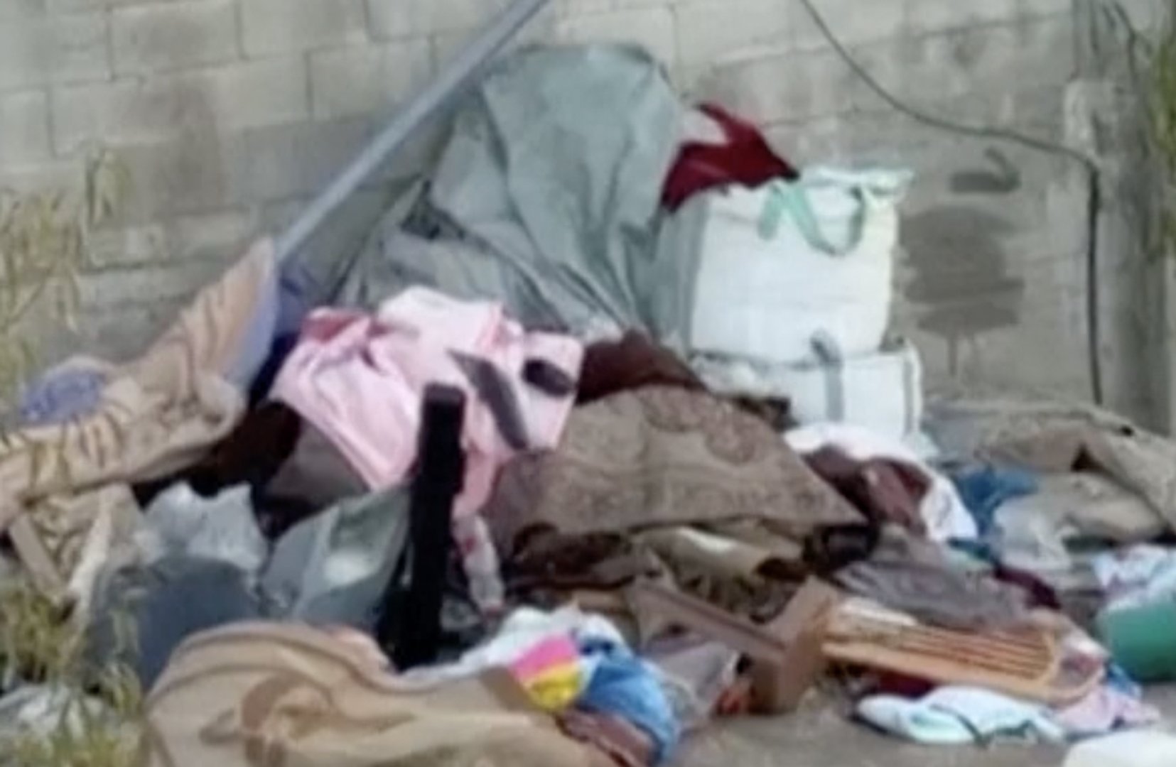 Video thumbnail for Israeli soldiers throw belongings from besieged Palestinian home