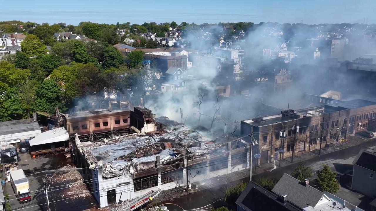Video thumbnail for US: 12-alarm fire rages at Belleville warehouse complex in US.