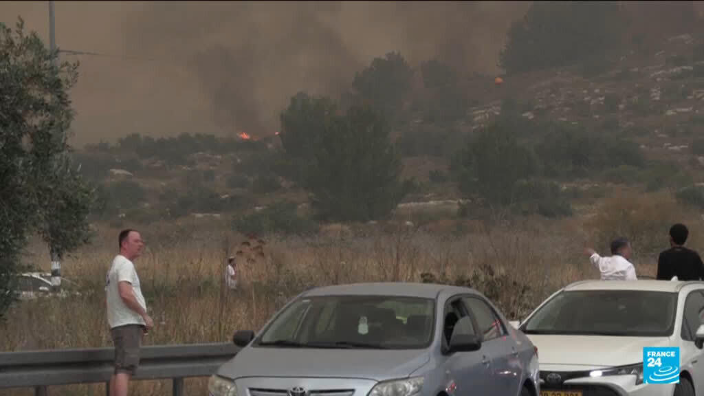 Video thumbnail for Israel reopens key roads as firefighters continue to battle blazes