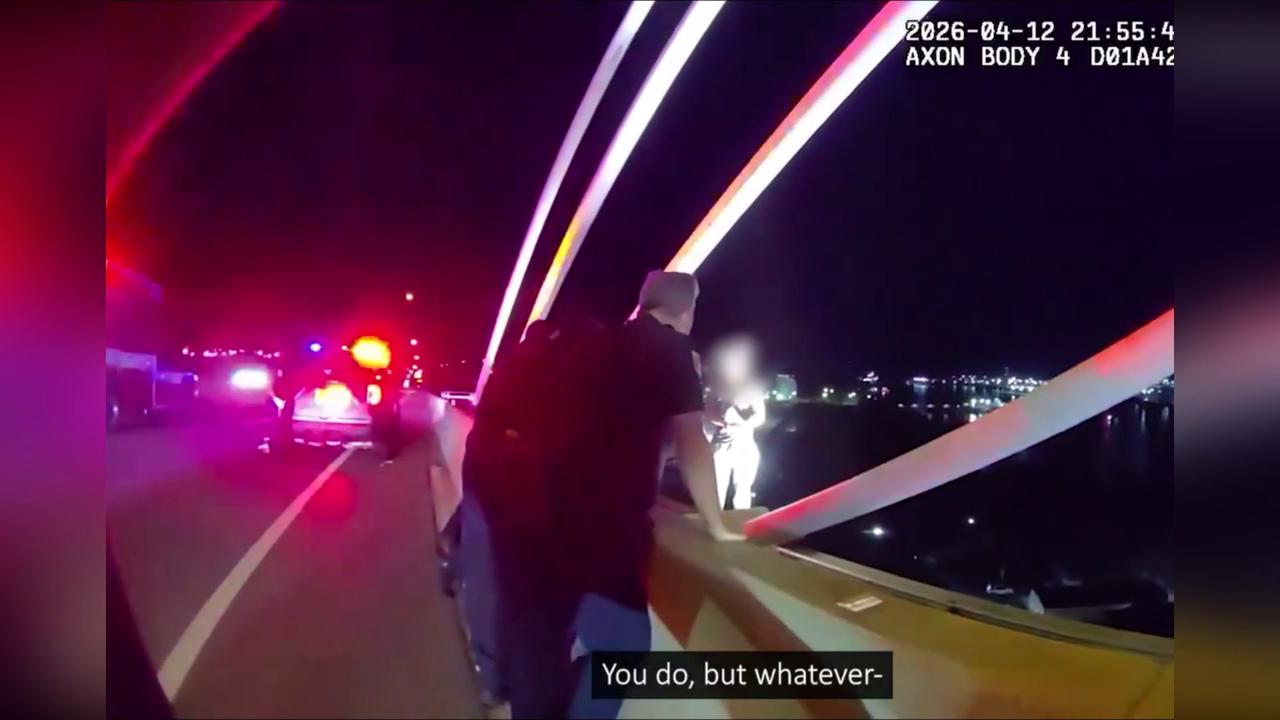 Video thumbnail for US: Man Pulled Back From Bridge Edge After Officer’s Emotional Intervention In Florida.