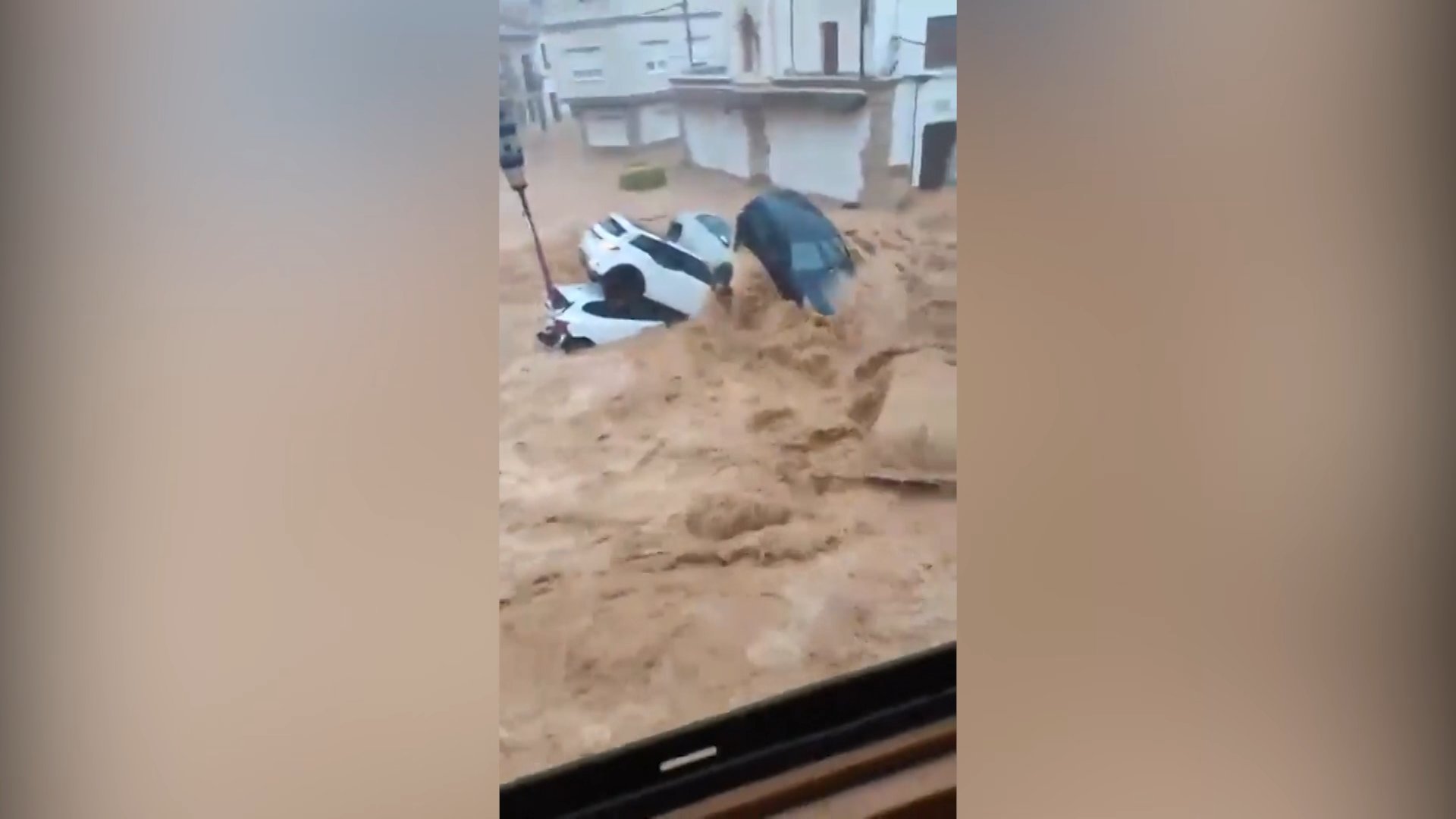 Video thumbnail for Floods sweep cars through streets after intense rain in Spain