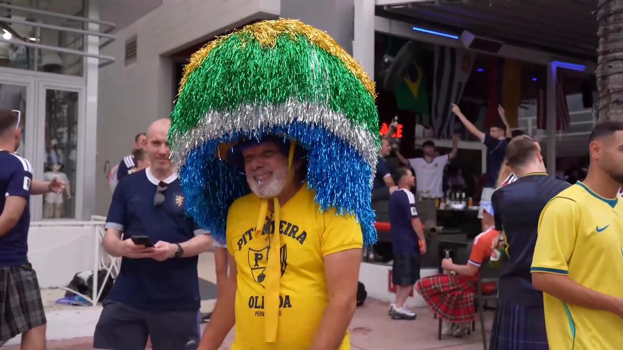 Video thumbnail for US: Brazil and Scotland fans gather on Miami's Ocean Drive ahead of World Cup match.