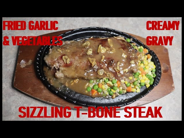 Video thumbnail for SIZZLING T-BONE STEAK WITH CRISPY FRIED GARLIC, MIXED VEGETABLES AND CREAMY GRAVY. HOMEMADE RECIPE.