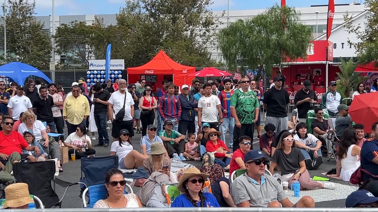 Video thumbnail for US: Fans gather at Los Angeles' Original Farmers Market to watch Spain-Saudi Arabia match.