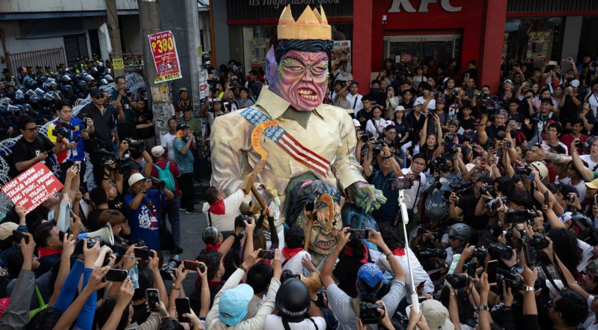 Video thumbnail for Thousands march in Philippines, demanding Marcos resign over fraud scandal