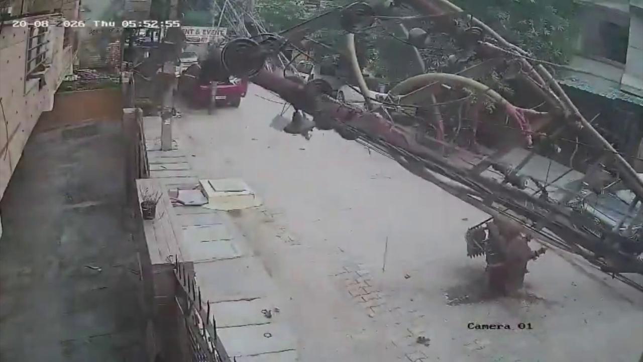Video thumbnail for India: Dilapidated electricity pole collapses onto road along with transformer, creating sudden hazard for commuters.