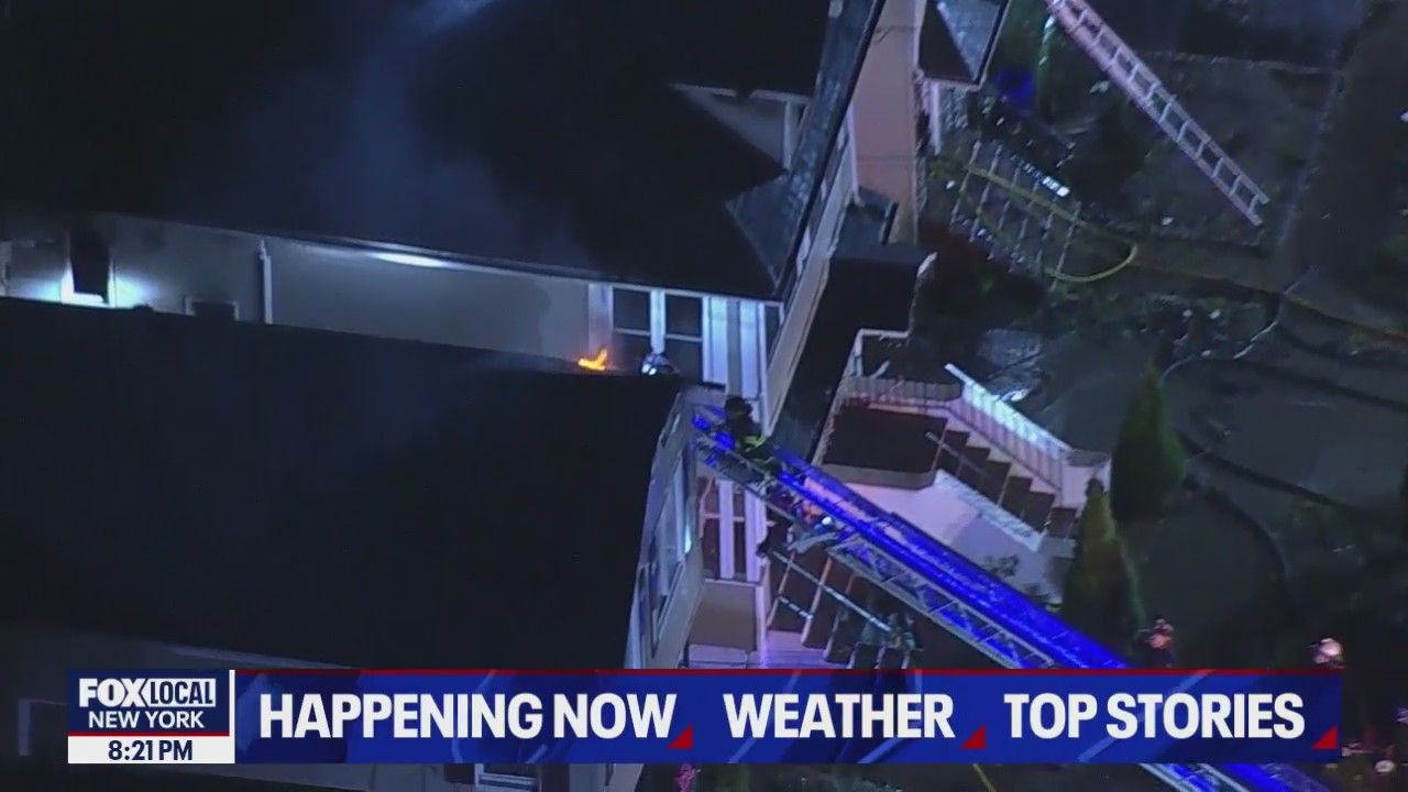 Video thumbnail for 4-alarm fire tears through three multi-family homes in Roselle, New Jersey