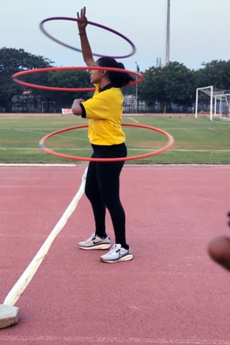 Video thumbnail for Fastest 100m while spinning three hula hoops (female)  32.01 seconds by Janani .R.S