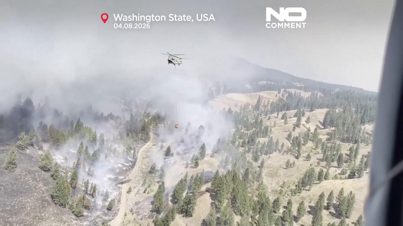 Video thumbnail for Smoke towers above Washington forests as firefighting continues