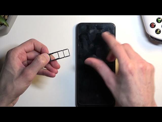 Video thumbnail for How to Insert Nano SIM and SD Cards into SAMSUNG Galaxy A03?