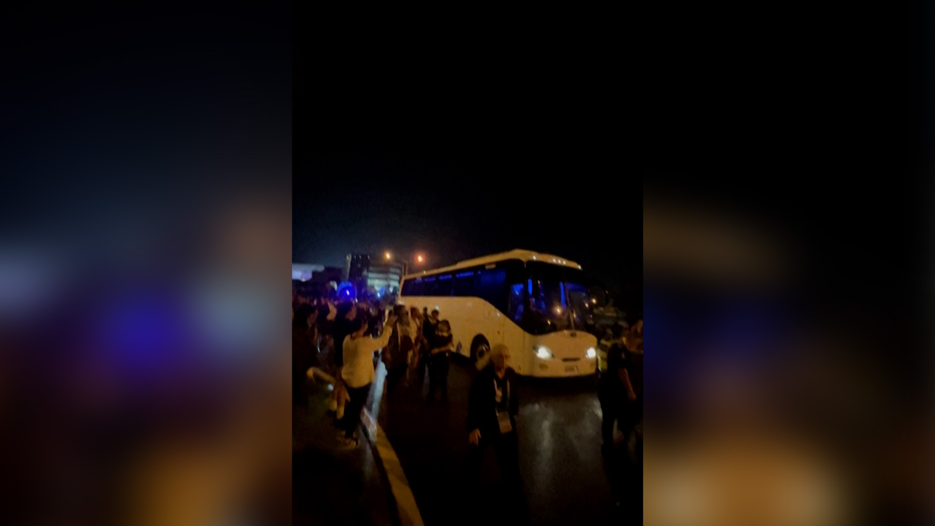 Video thumbnail for Crowd chants ‘save our girls’ at bus carrying Iran women’s team