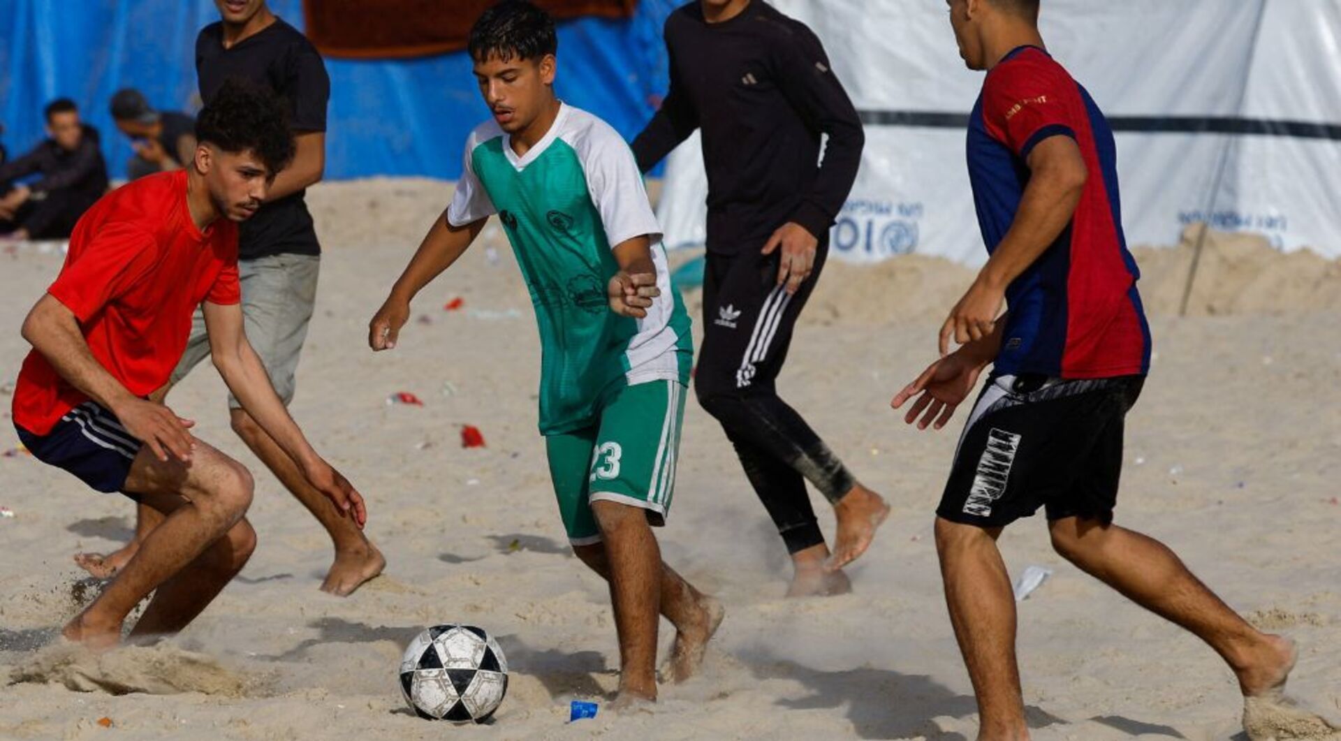 Video thumbnail for Gaza’s ‘World Cup’: Palestinians play barefoot football among rubble