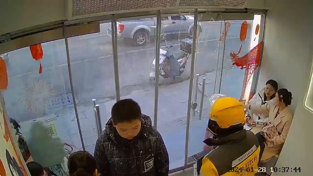 Video thumbnail for China: Chinese rider accidentally shatters glass door after reaching back to close it.