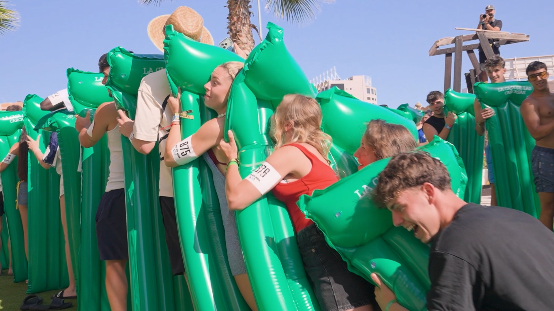 Video thumbnail for Largest human air bed/lilo dominoes - 878 participants achieved by BYE BYE WEEK