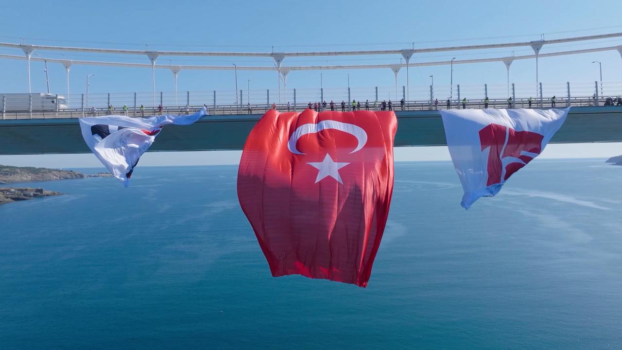 Video thumbnail for Türkiye: DRONE - Türkiye displays giant flags on major bridges ahead of July 15 anniversary.