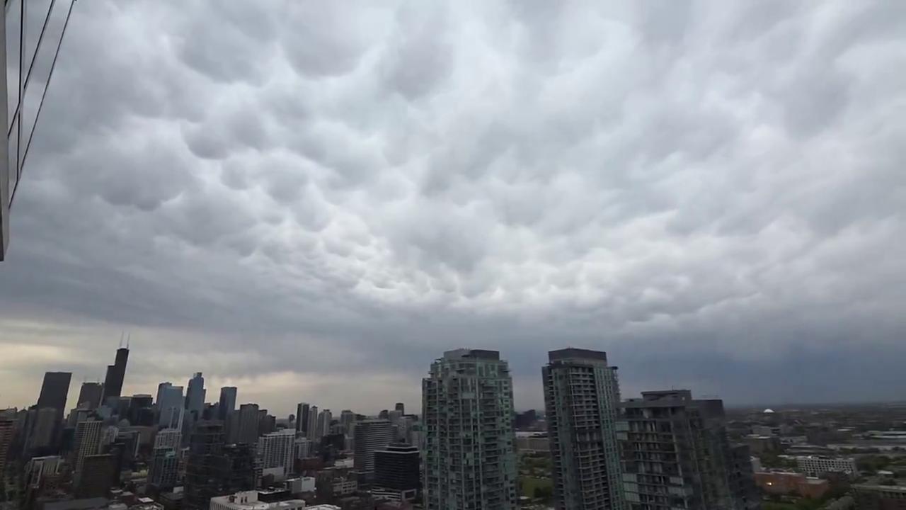 Video thumbnail for US: Mammatus Clouds Appear Fill The Sky Over Downtown Chicago.