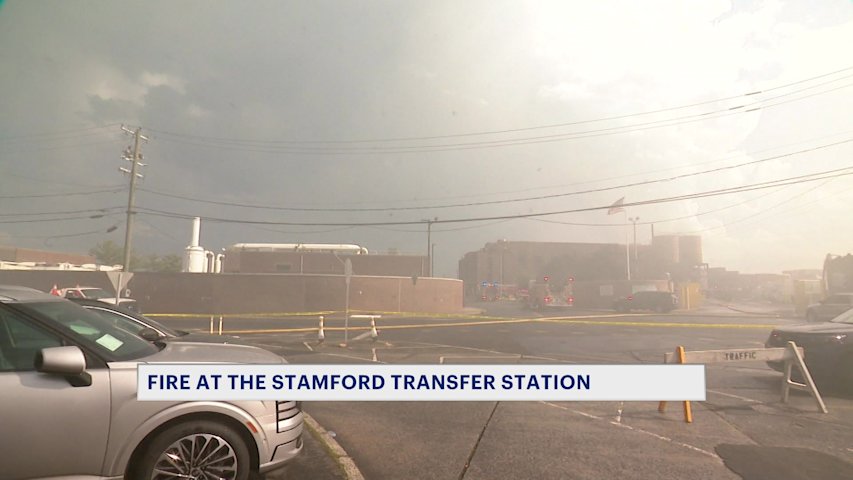 Video thumbnail for Heavy smoke fills area near the Stamford Transfer Station as firefighters respond to fire