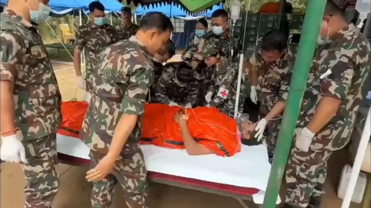 Video thumbnail for Nepal: NEPAL TUNNEL RESCUE: ONE PERSON PULLED OUT ALIVE, SEARCH CONTINUES FOR OTHERS TRAPPED INSIDE.