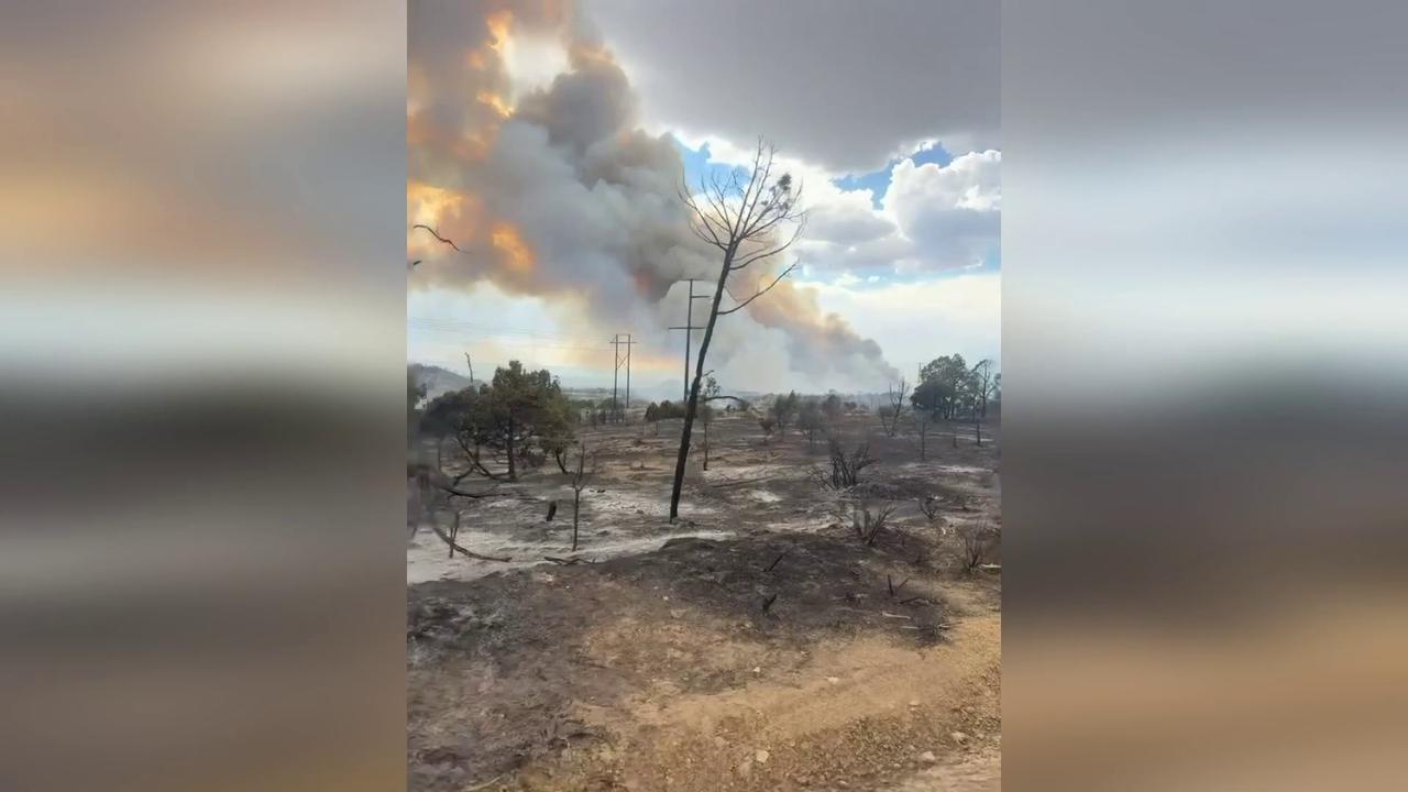 Video thumbnail for US: Massive Smoke Tower Rises Above Colorado Wildfire As Blaze Continues To Spread.