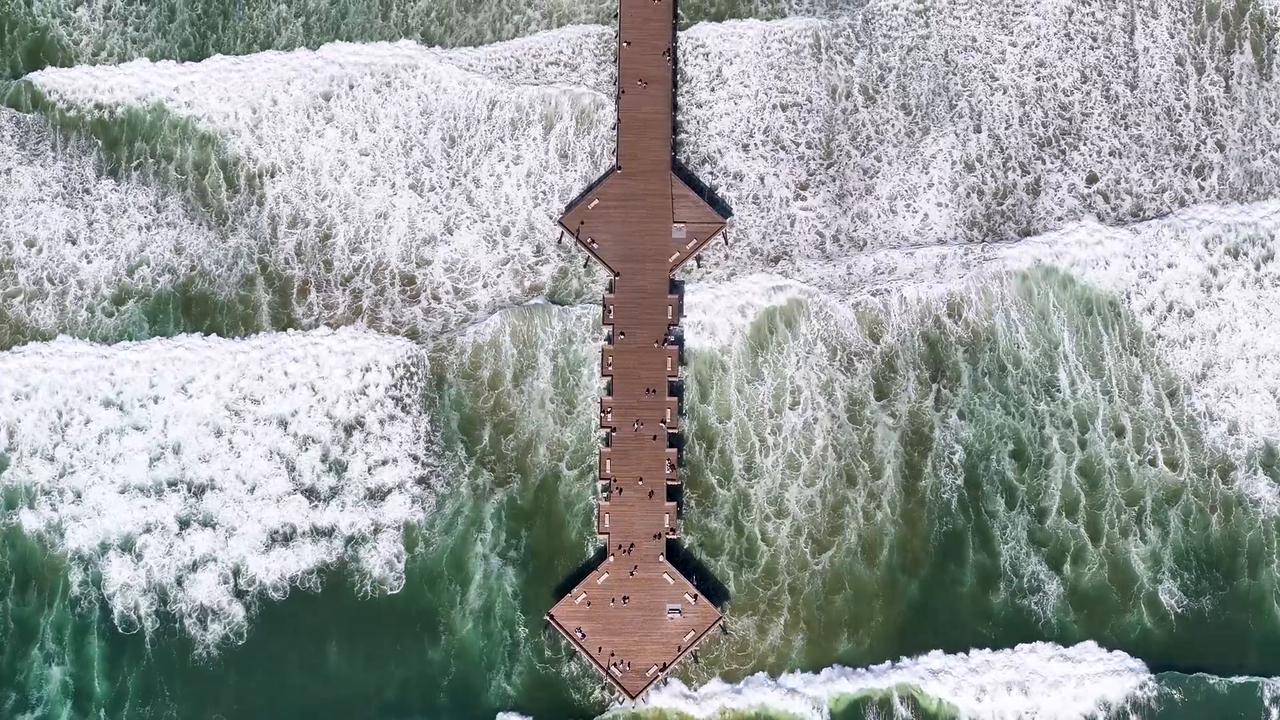 Video thumbnail for US: Drone footage captures bustling spring weekend at Pismo Beach in California.