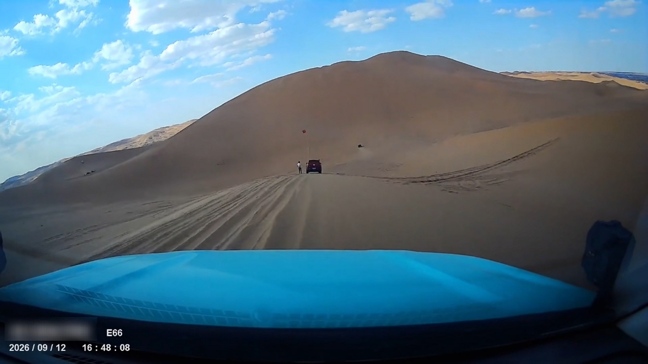 Video thumbnail for Car Rolls Down Desert Hill and Flips in Ningxia, China